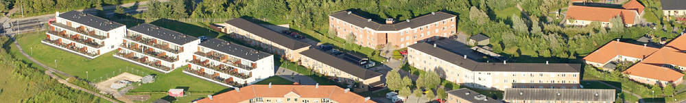 Nye boligvarterer skyder op i bybilledet. Copyright Steen Lee Christensen/ Aalborg Luftfoto.